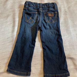 24 month unisex wrangler jeans.